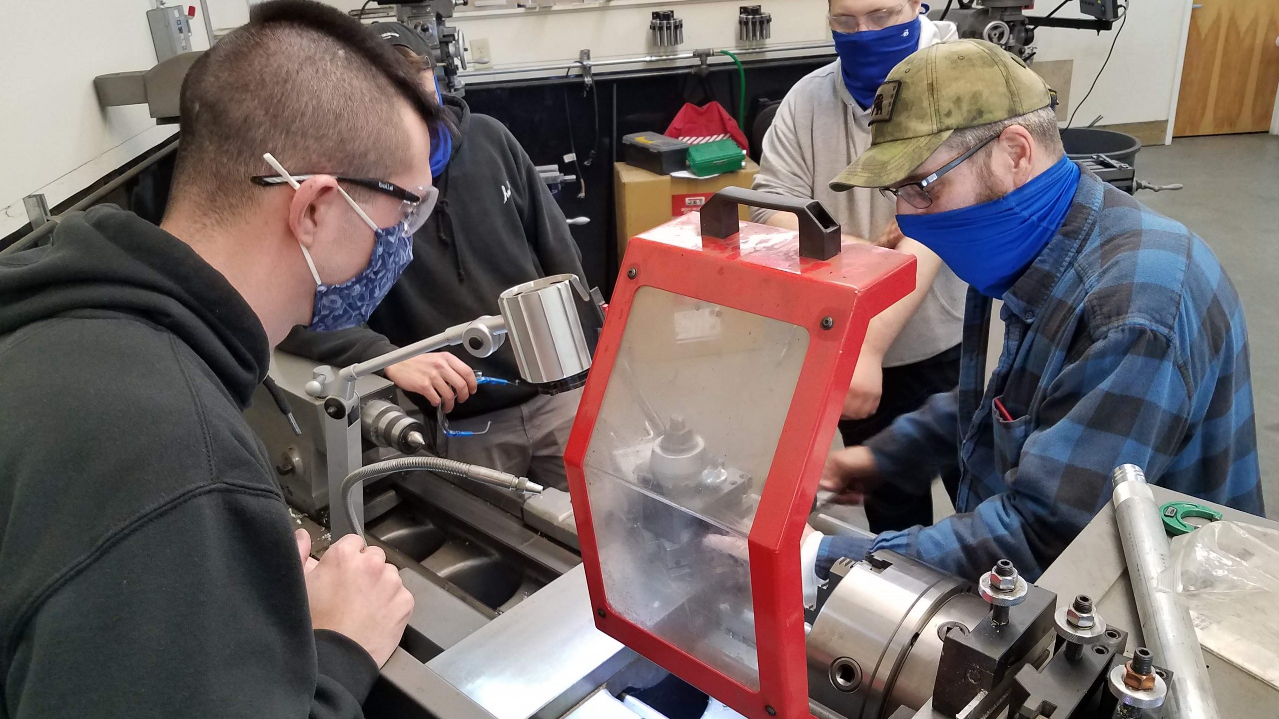 Instructor Chad Groves providing instruction to Machining students at WWTC